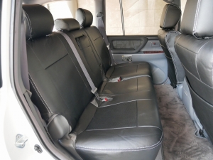 ランクル１００輸出スタイル　TOYOTAロゴグリル：LINE-X塗装